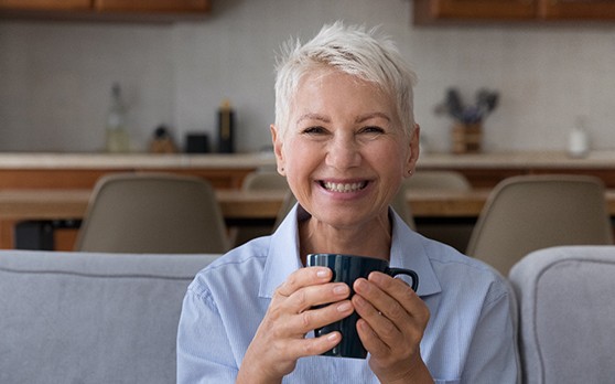 Woman smiling on a couch