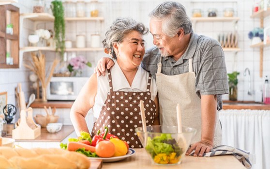 Couple smiling with dentures in Rockville