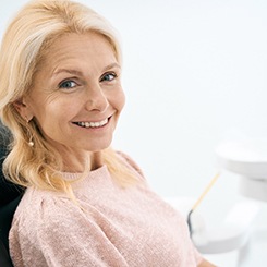 Woman smiling in the dental chair