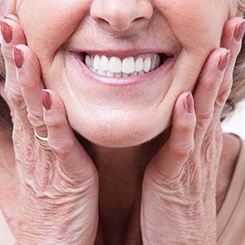 closeup of woman smiling with dentures