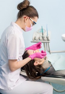 Woman attending dental cleaning