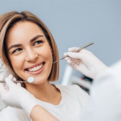 Woman visiting her dentist for a checkup 