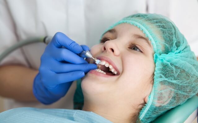 Patient receiving fluoride treatment