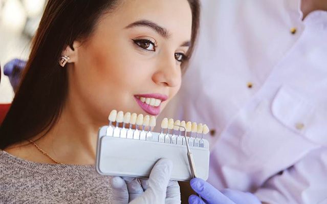 woman getting veneers in Rockville