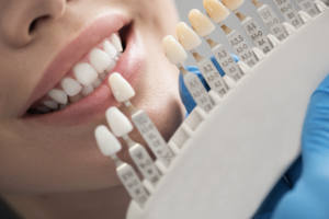 woman getting a dental crown replacement  