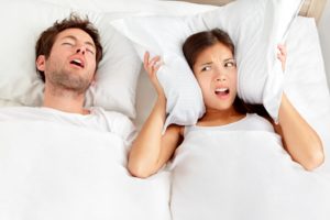 Man snoring because of sleep apnea.