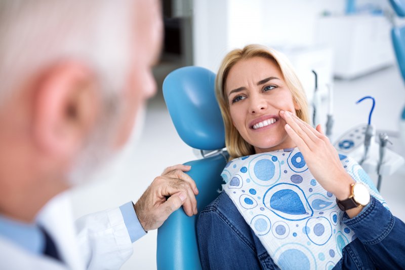 a patient visiting her dentist for emergency dentistry