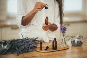 Woman using essential oils.
